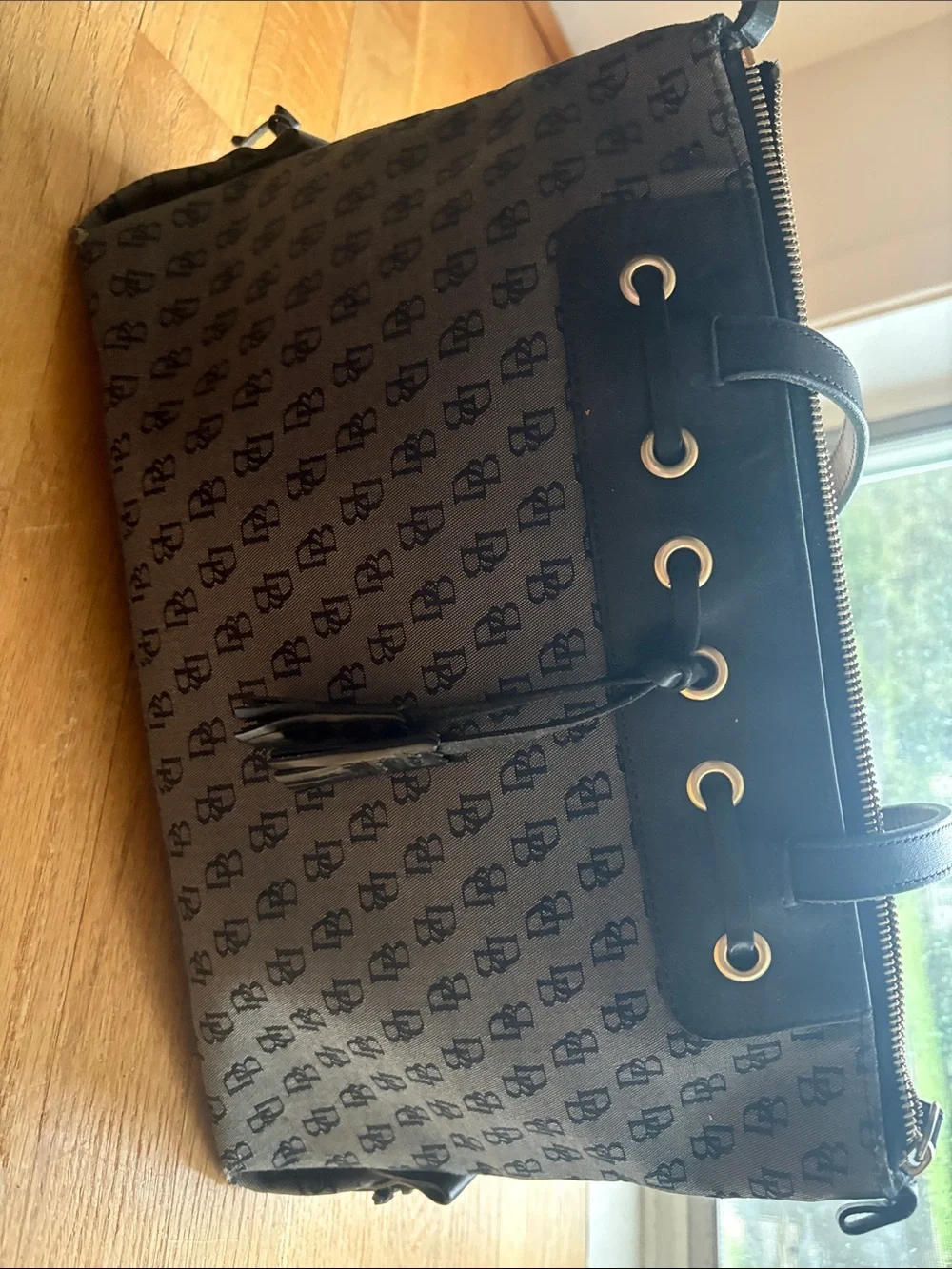 Dooney Black Patterned Tote Bag with Grommet Detail - woman’s